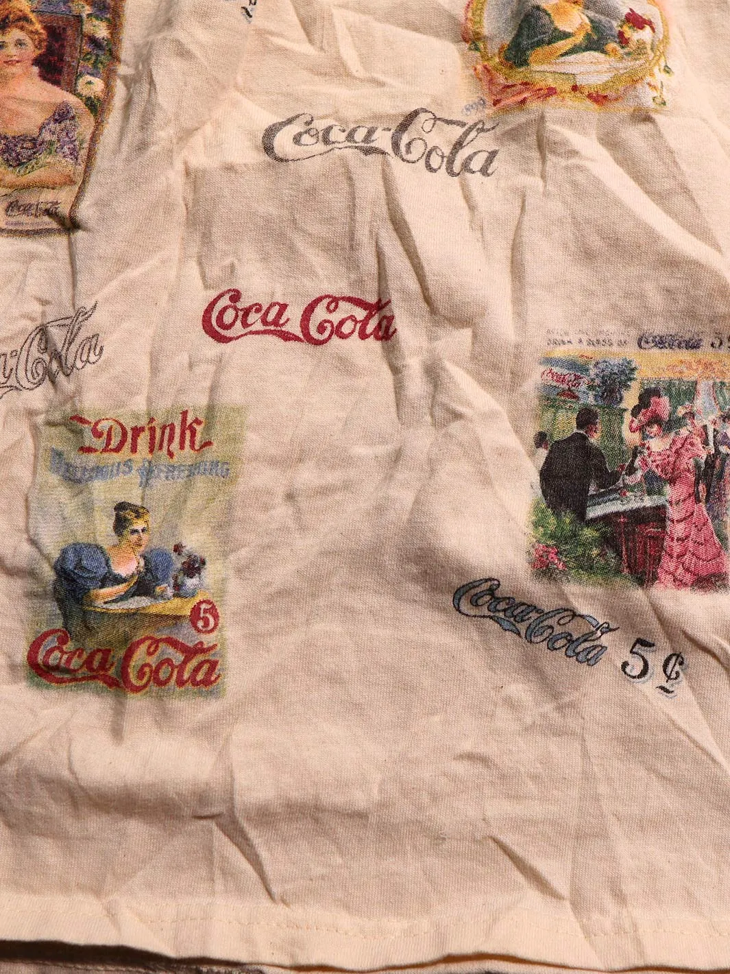 Coca-Cola Brand Merchandise All Over Print Logos Vintage T-Shirt (L)